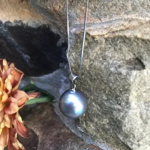 Large mother of single pearl on silver chain