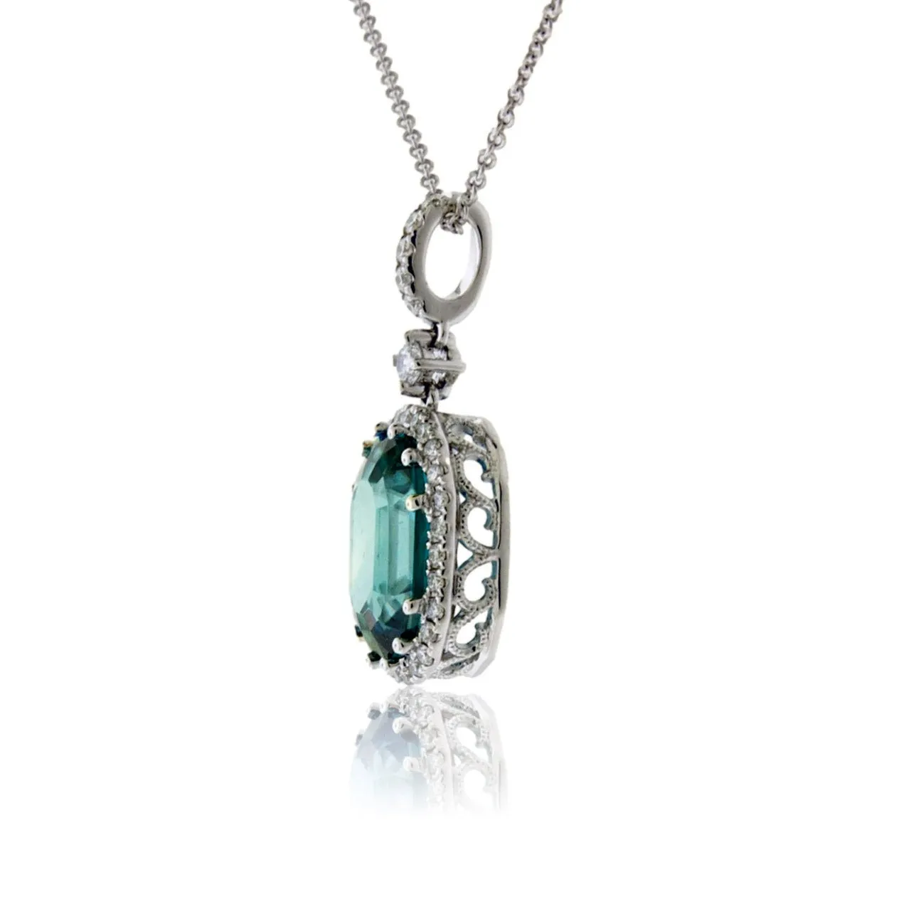 Oval Blue Zircon in Diamond Halo Pendant