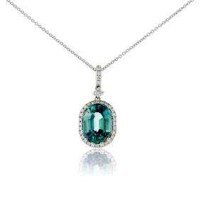 Oval Blue Zircon in Diamond Halo Pendant