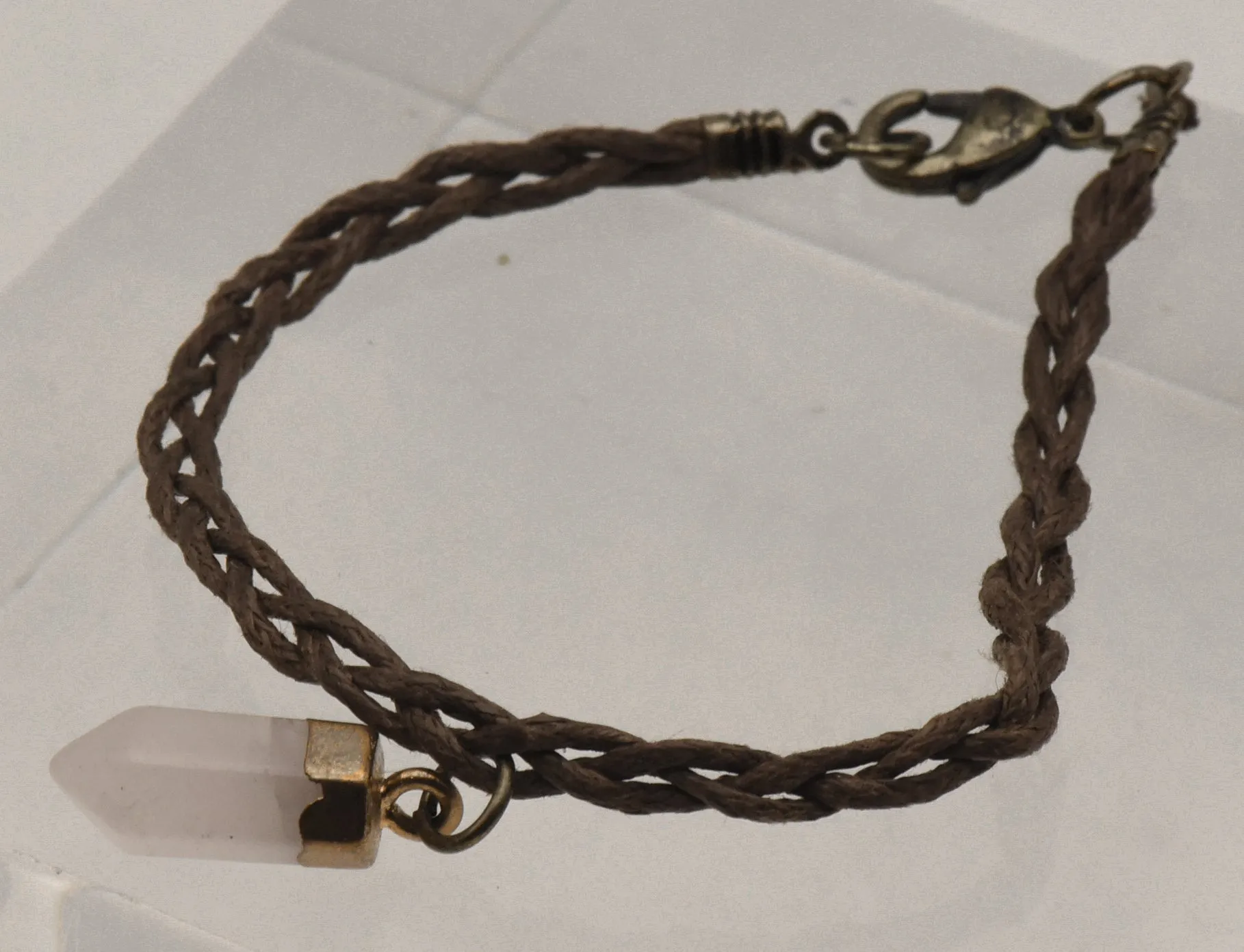 Rose Quartz Point on Braided Leather Cord Bracelet