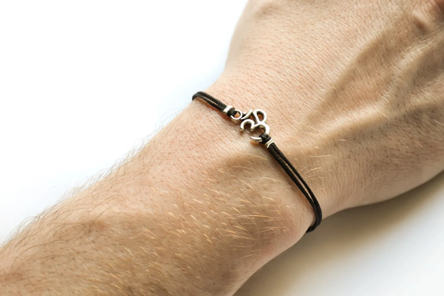 Silver Om bracelet for men, black cord, handmade yoga jewelry for man