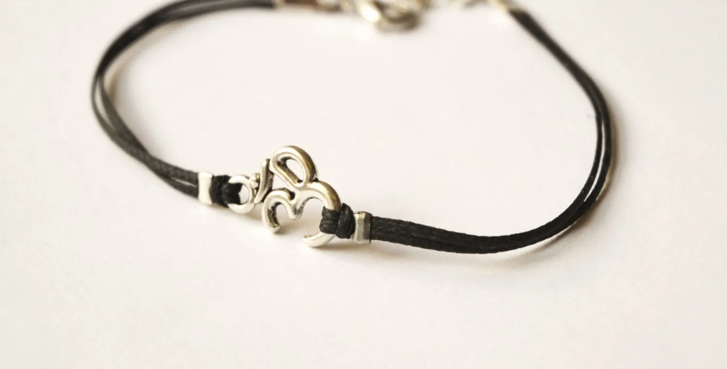 Silver Om bracelet for men, black cord, handmade yoga jewelry for man