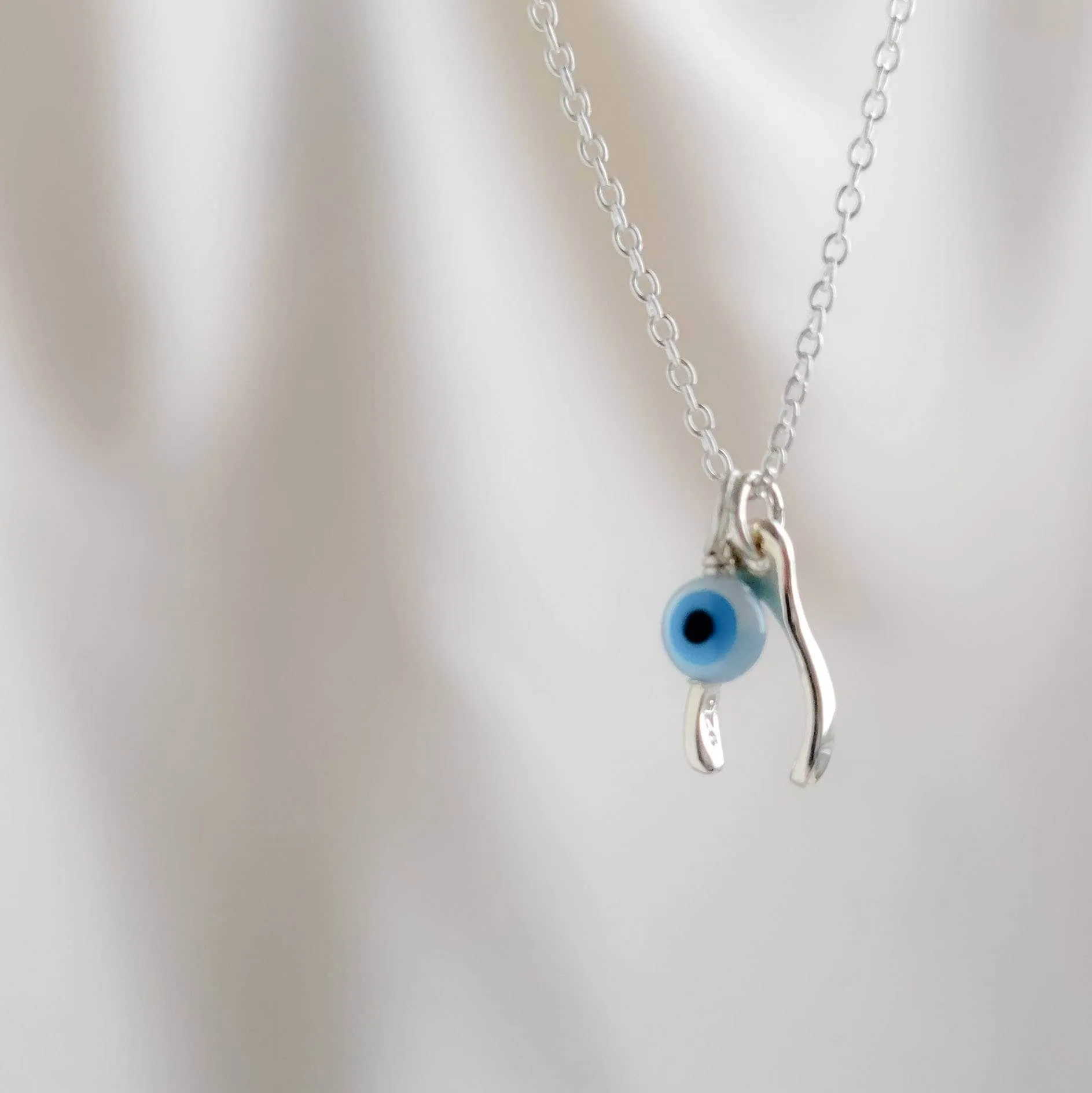 Tiny Wishbone & Evil Eye Necklace