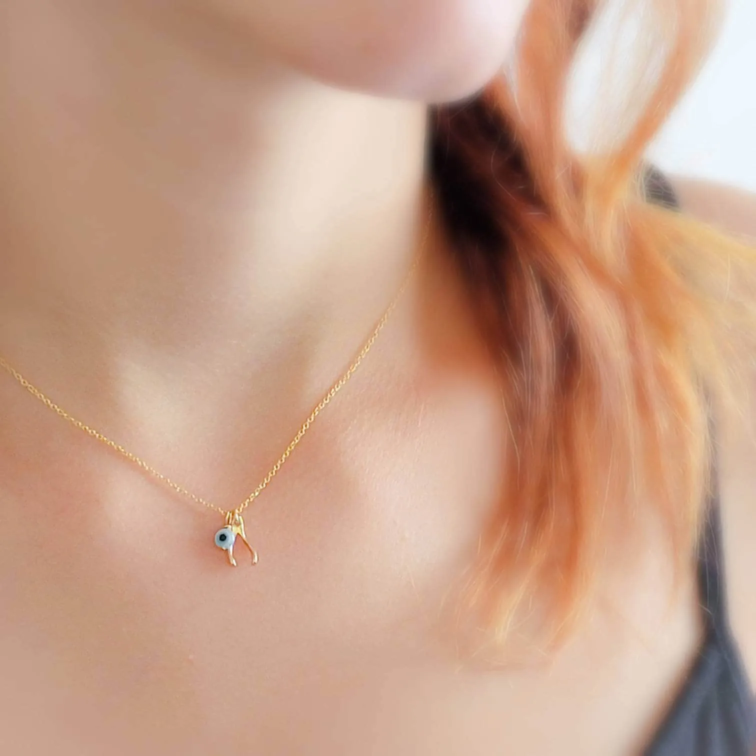 Tiny Wishbone & Evil Eye Necklace